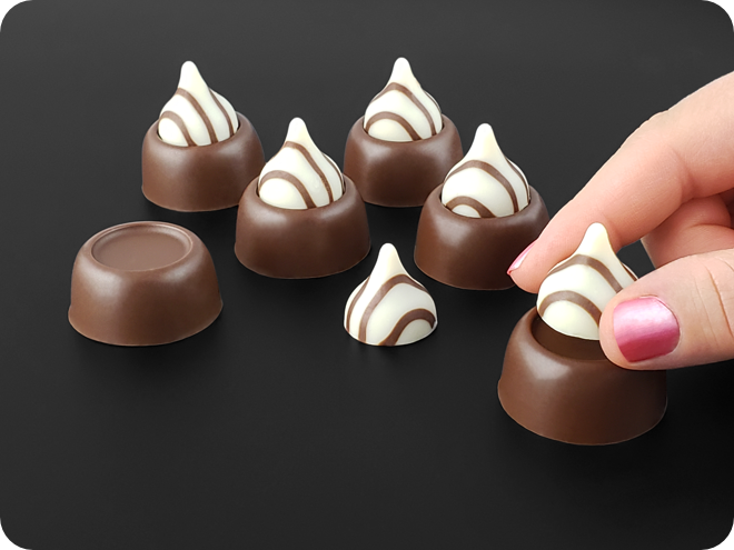 Unmold and Cap Your Mini Chocolate Covered Oreos